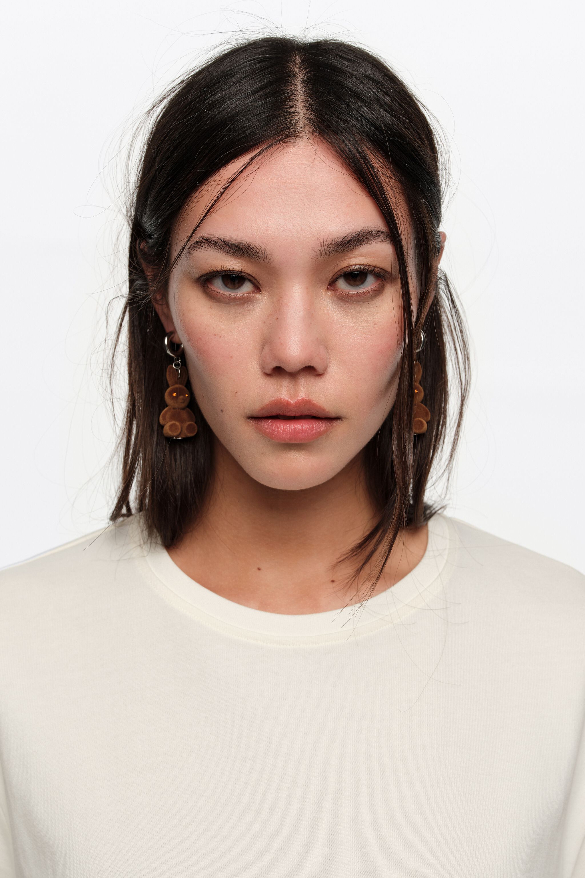 Brown flocked rabbit hoop earrings