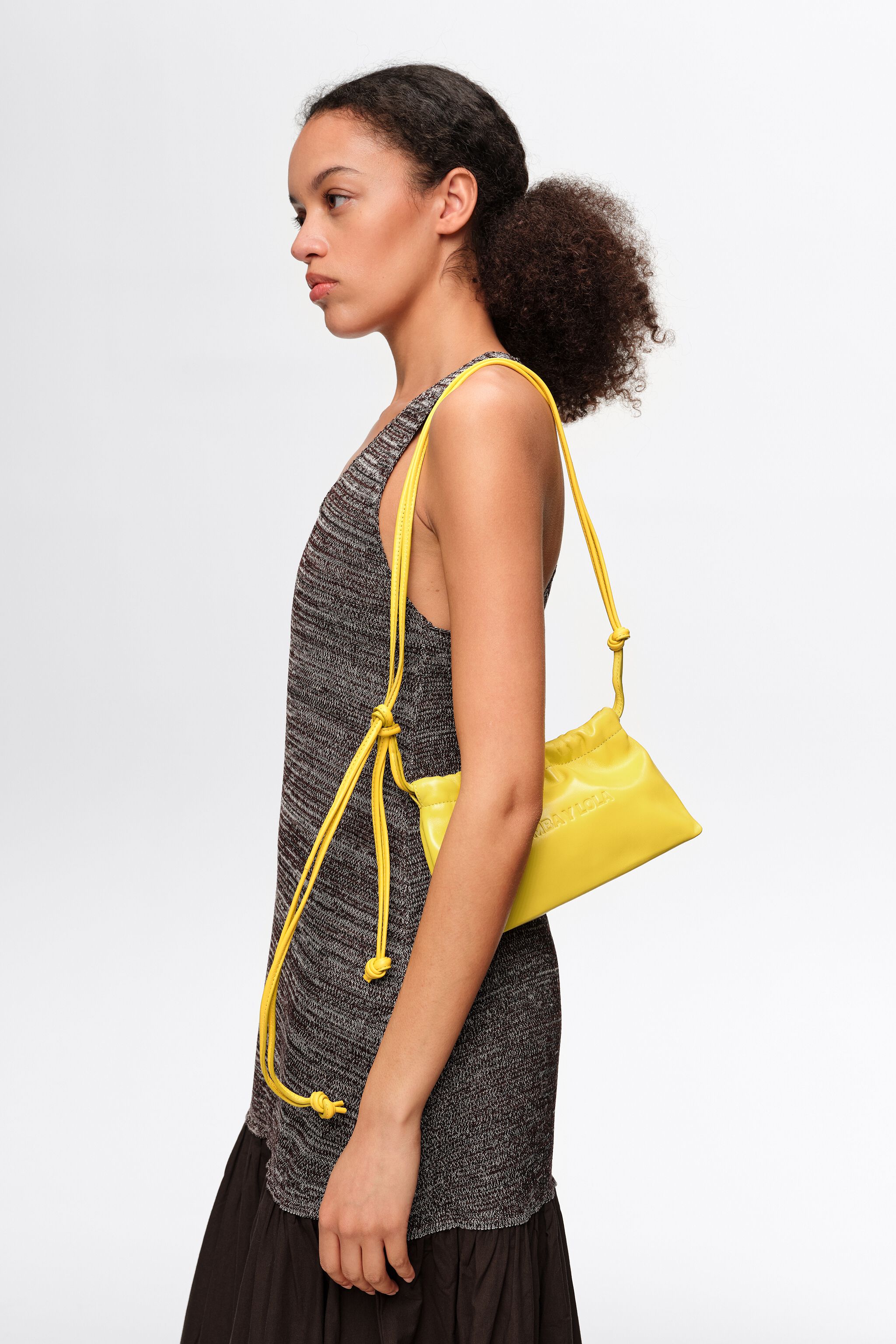 Mini yellow leather clutch bag