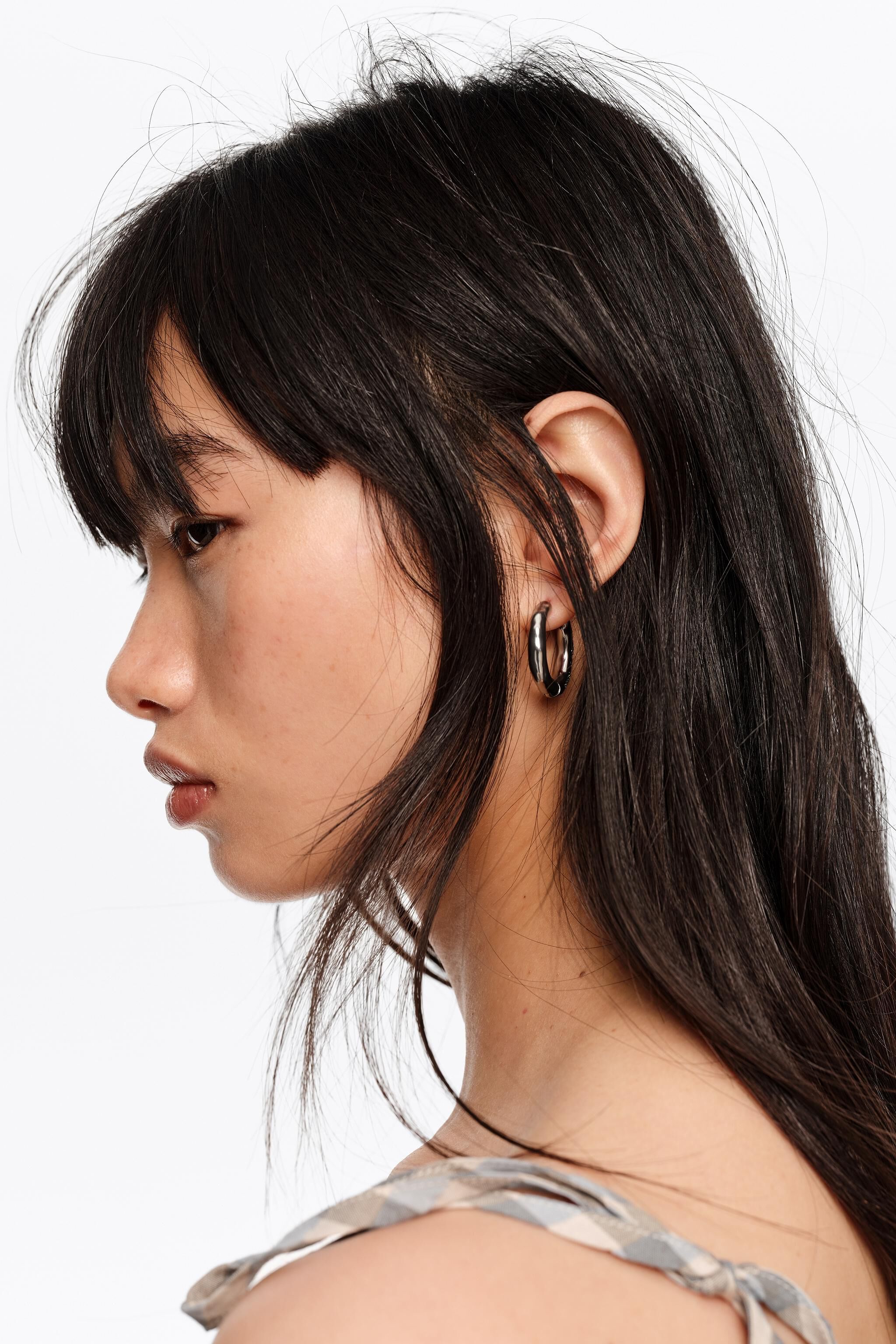 Silver irregular hoop earrings