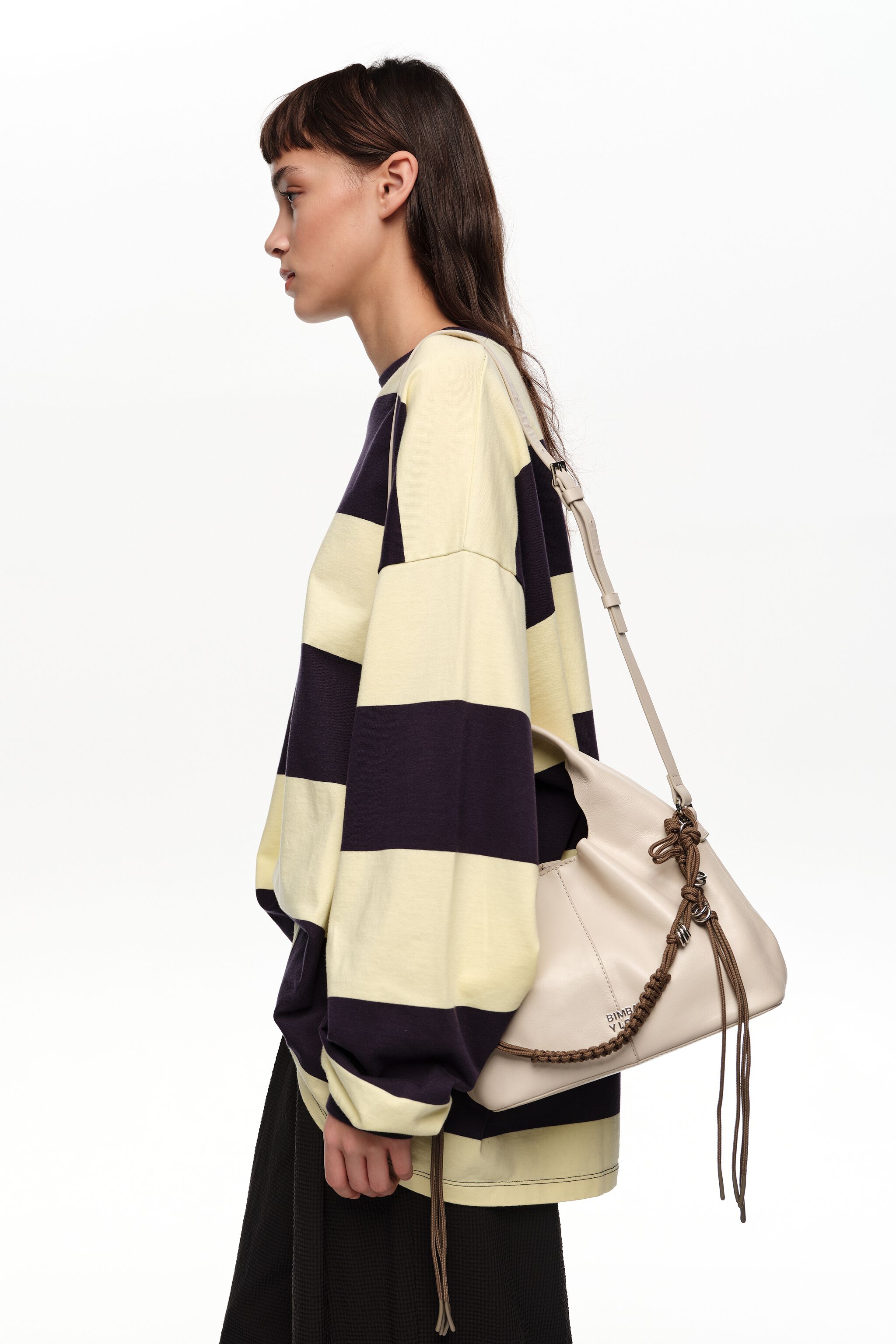 Small ivory shiny leather plaited handle Paper bag