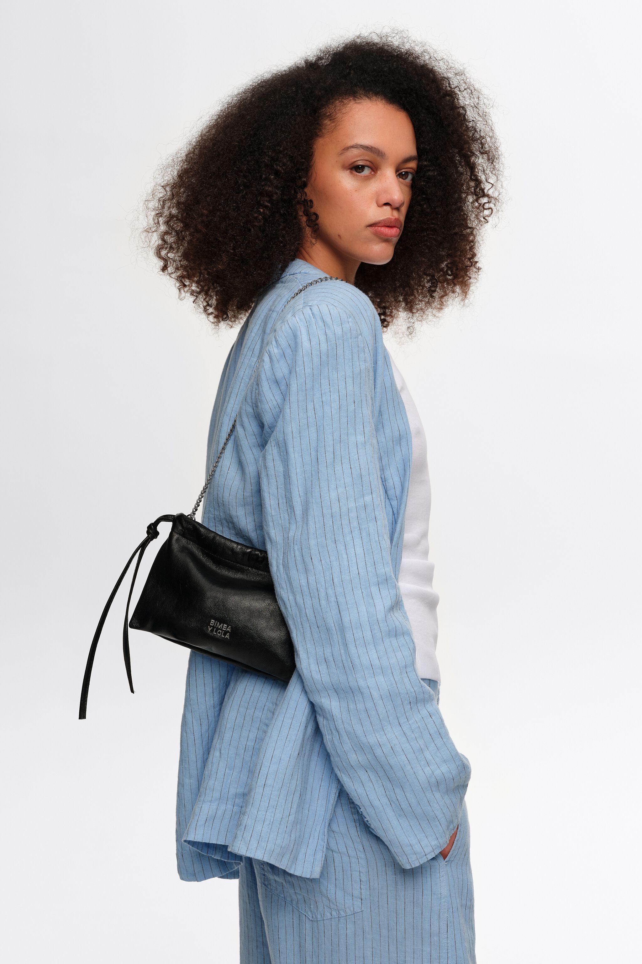 Mini black leather clutch bag