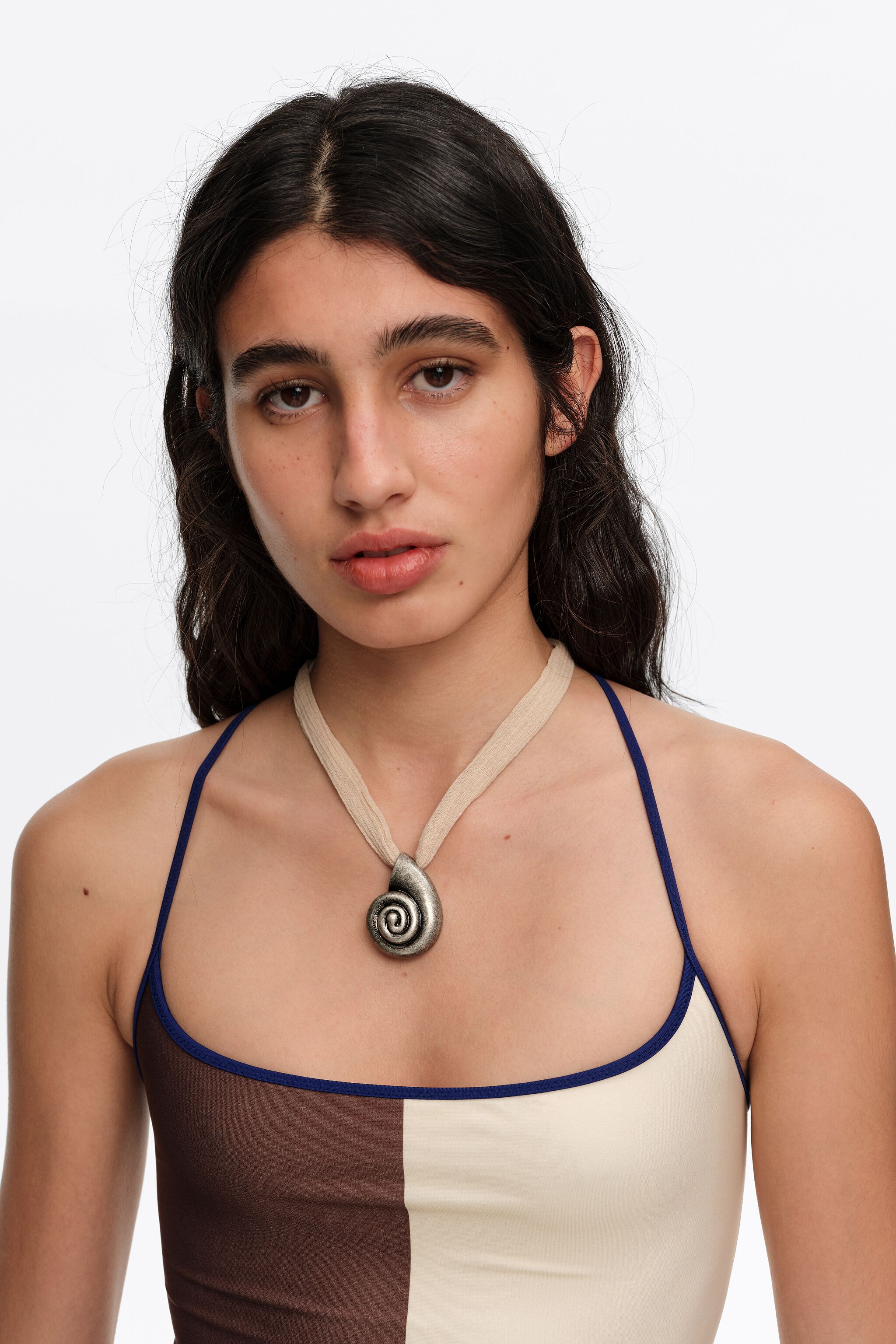 Nude woven necklace with aged silver seashell