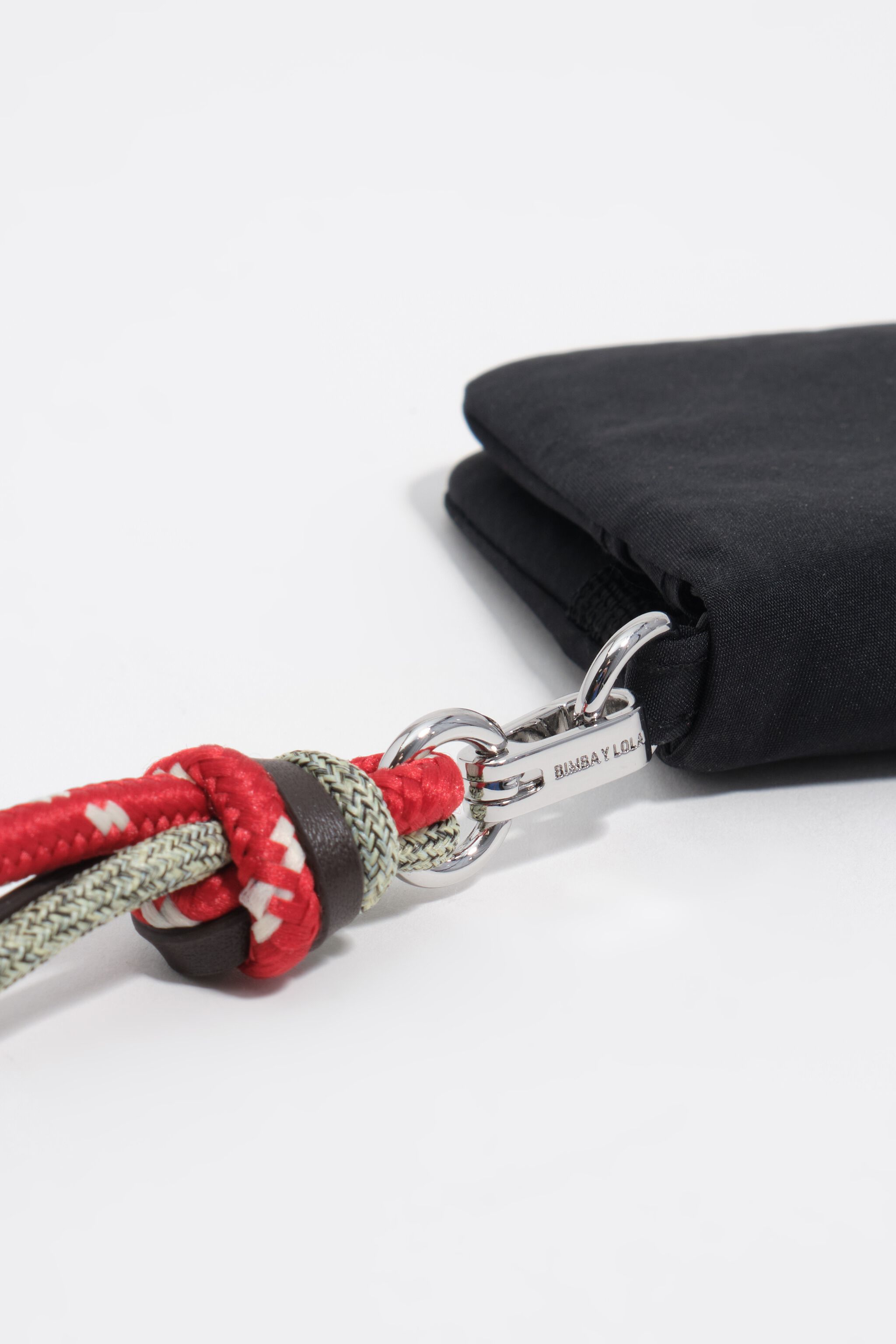 Small black nylon flap purse