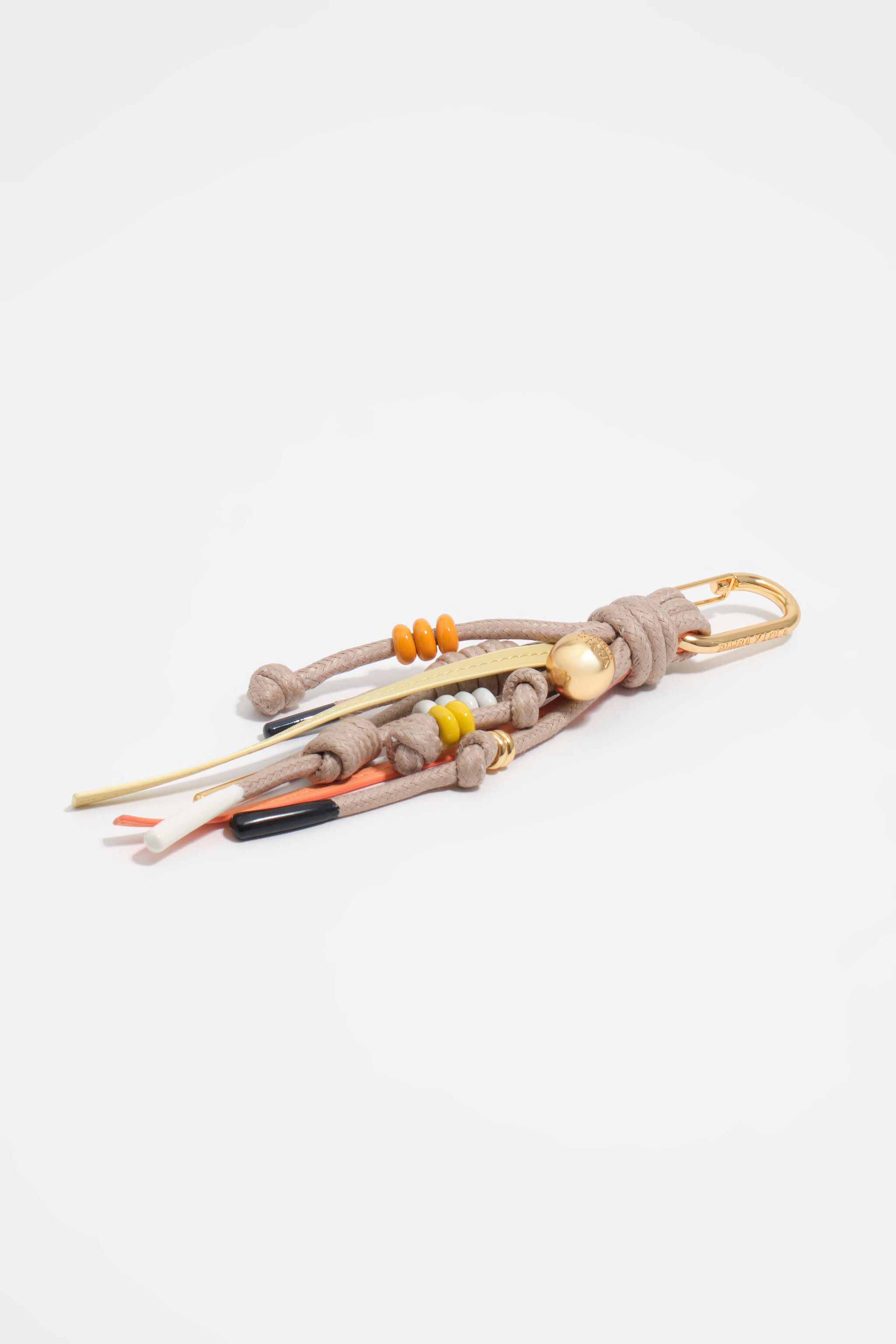 Pompom key ring with cords and beads