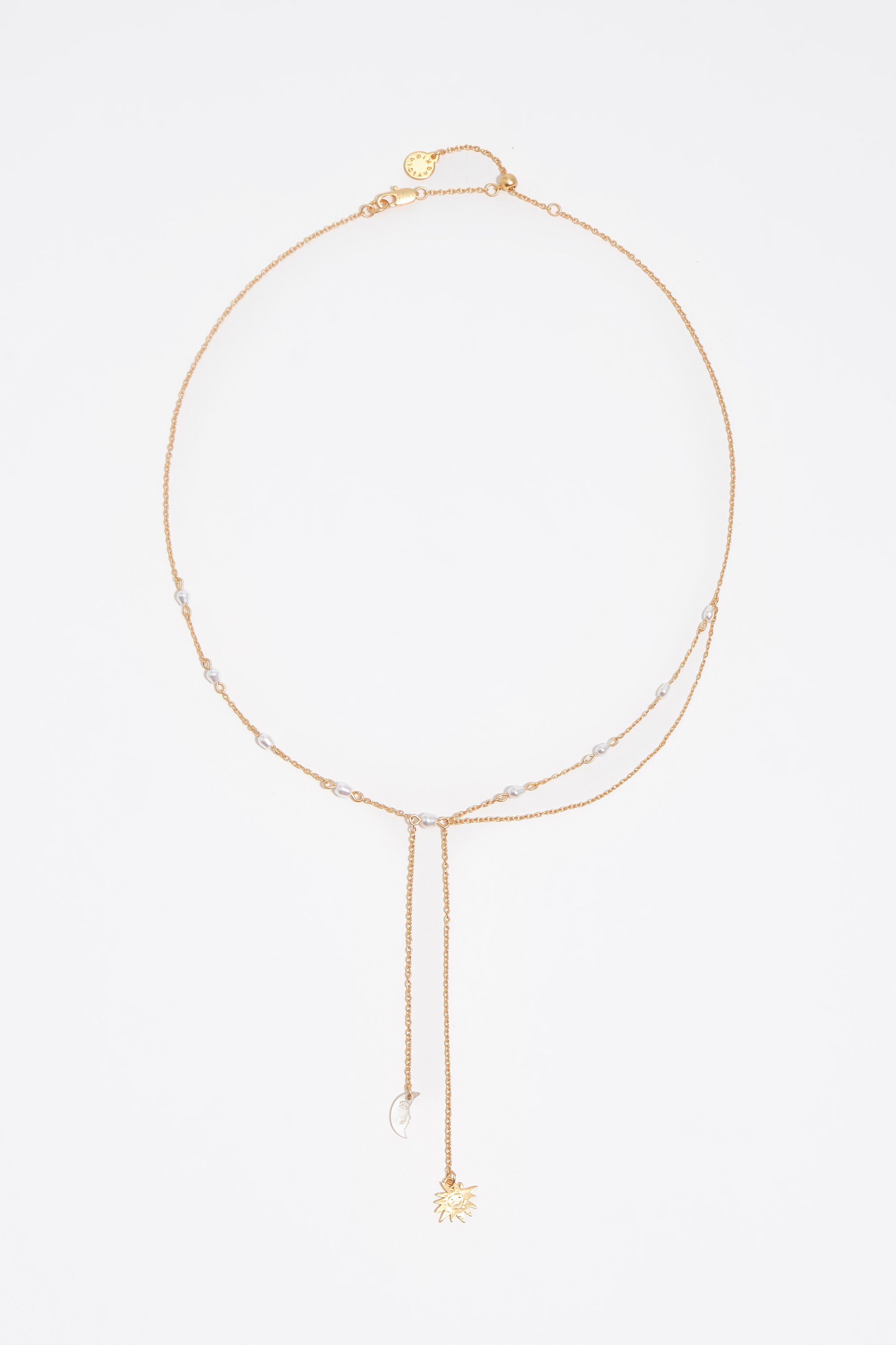 Sun and moon necklace with brushed gold chains