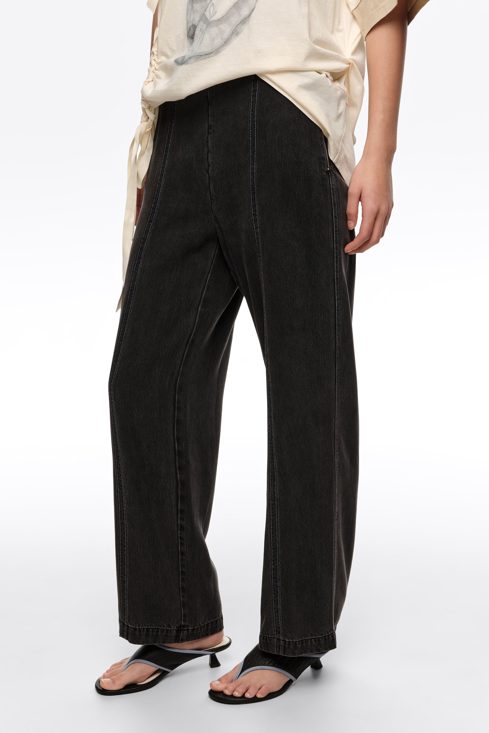 Straight washed black trousers with topstitching