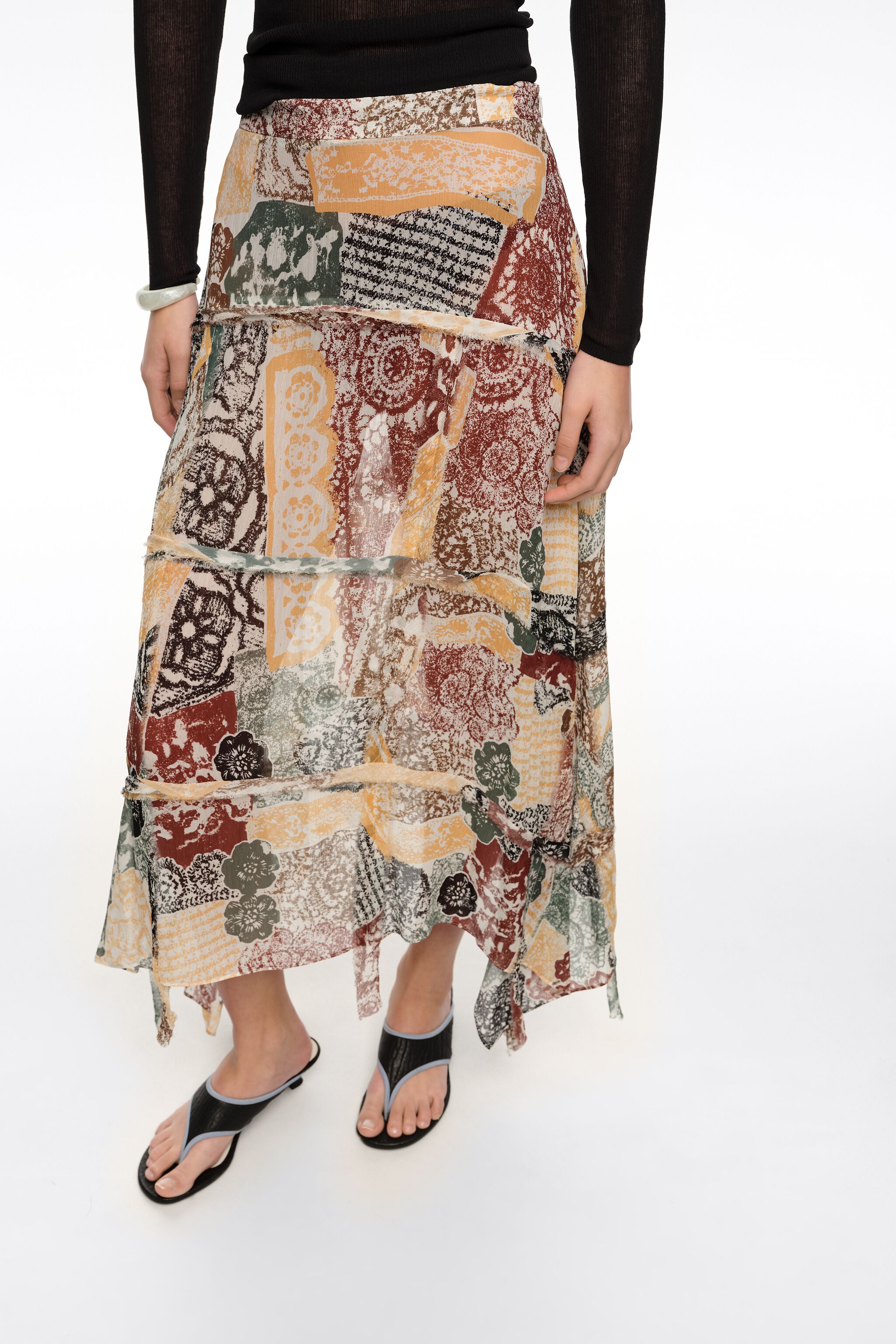 Ivory Lace fluid irregular fringed skirt