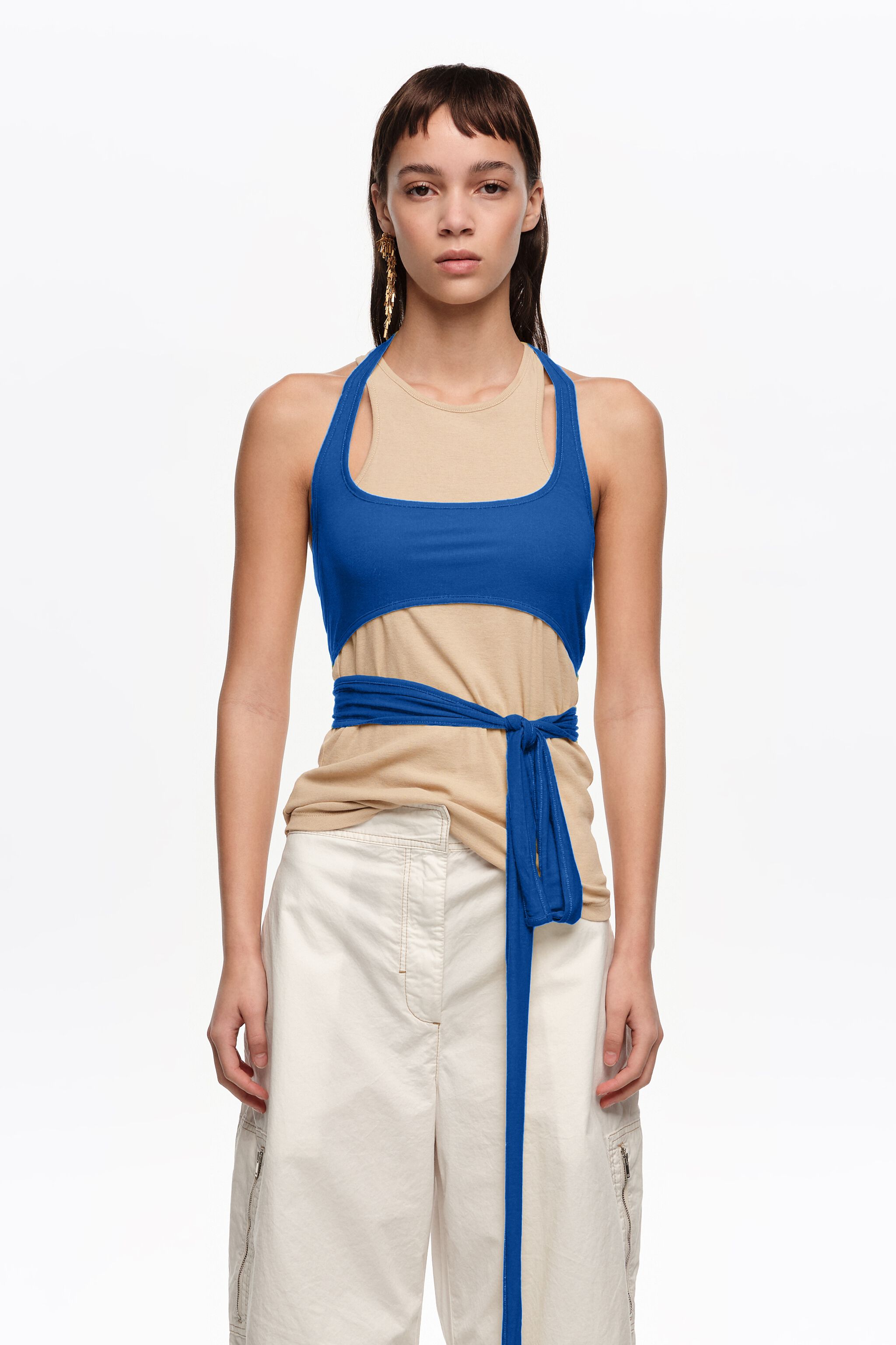 Top with overlay piece in contrast sand color