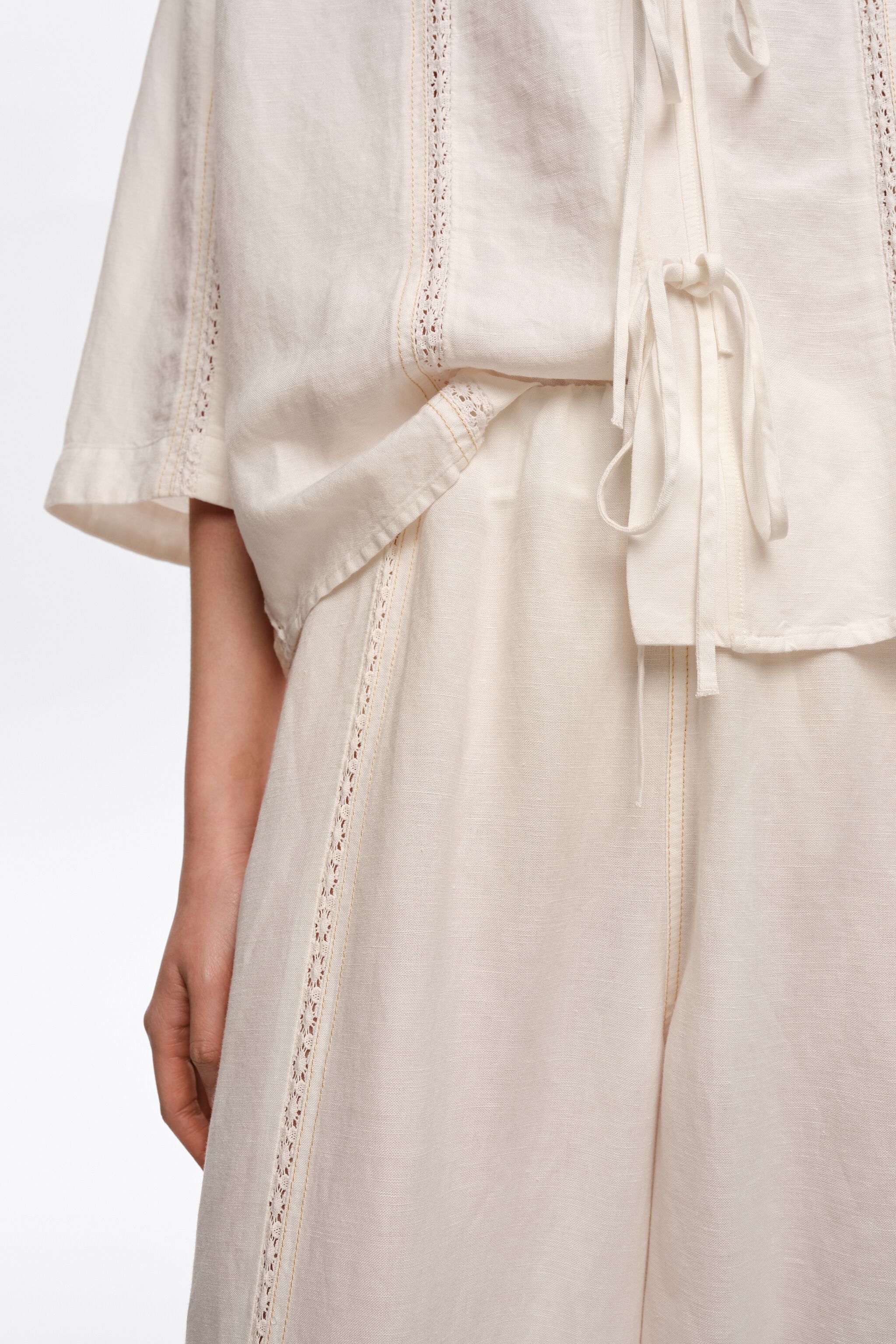 Wide white linen lace trousers