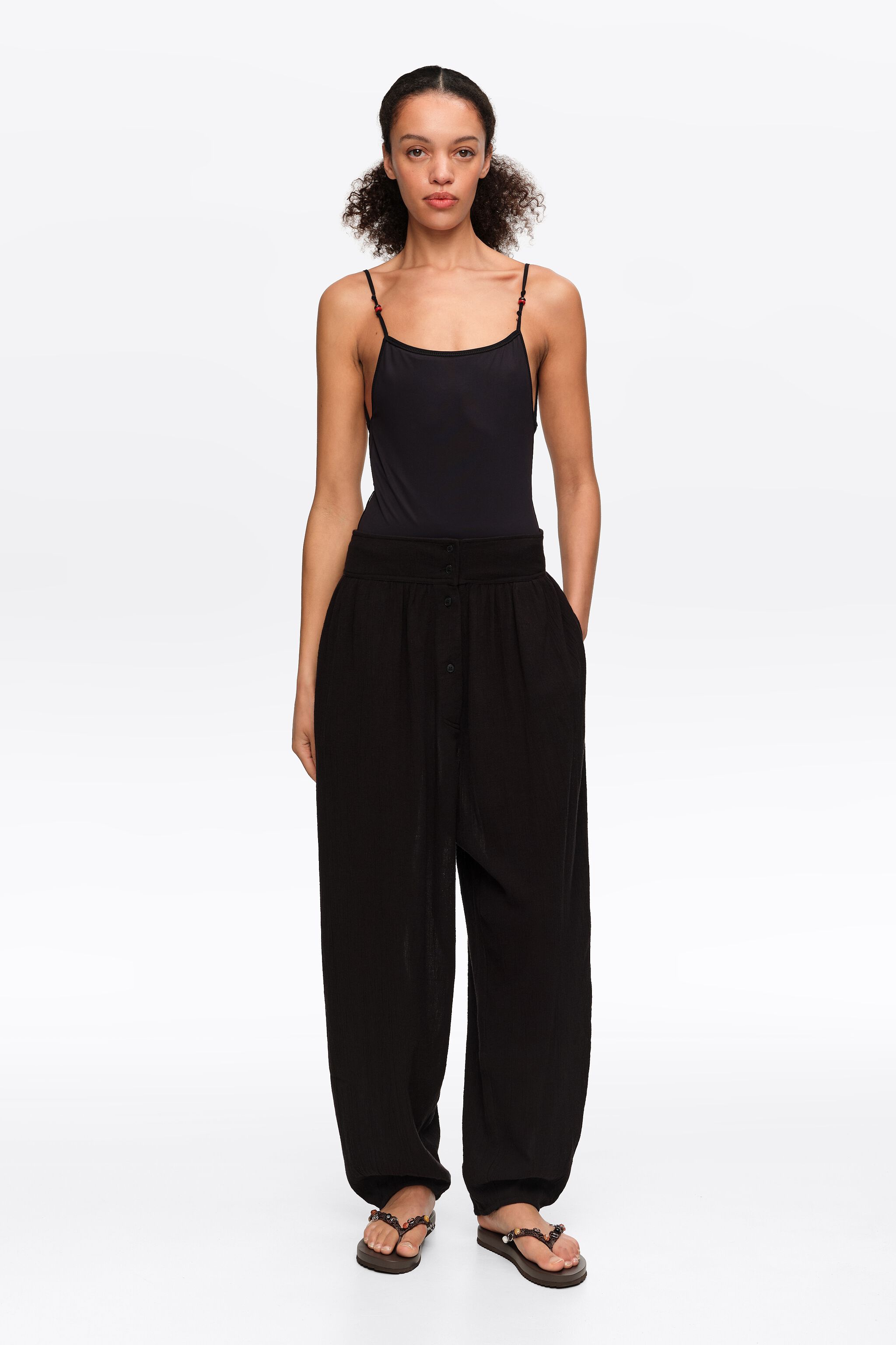 Black textured cotton harem trousers
