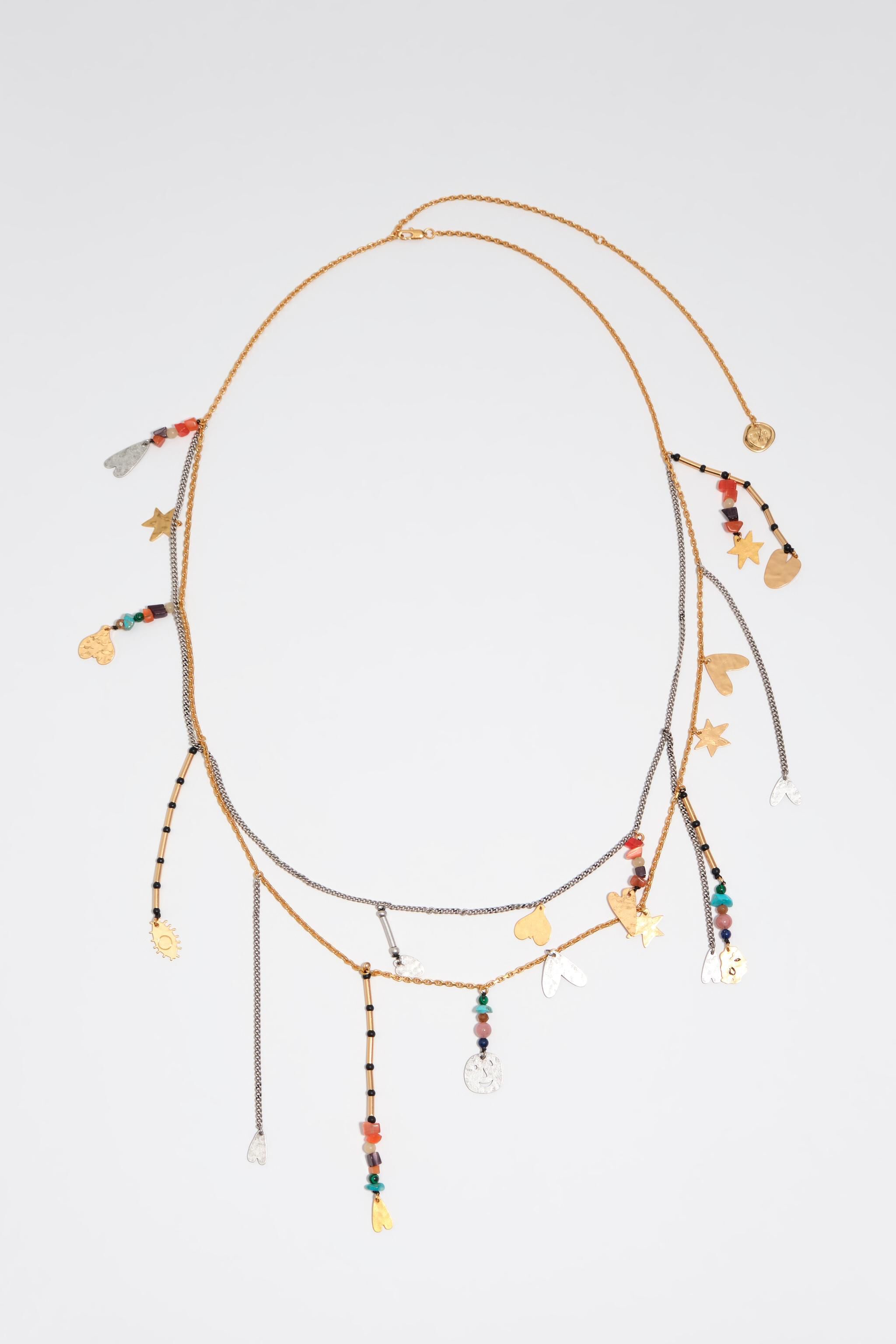 Belt necklace with metal silhouettes and multicolor stones