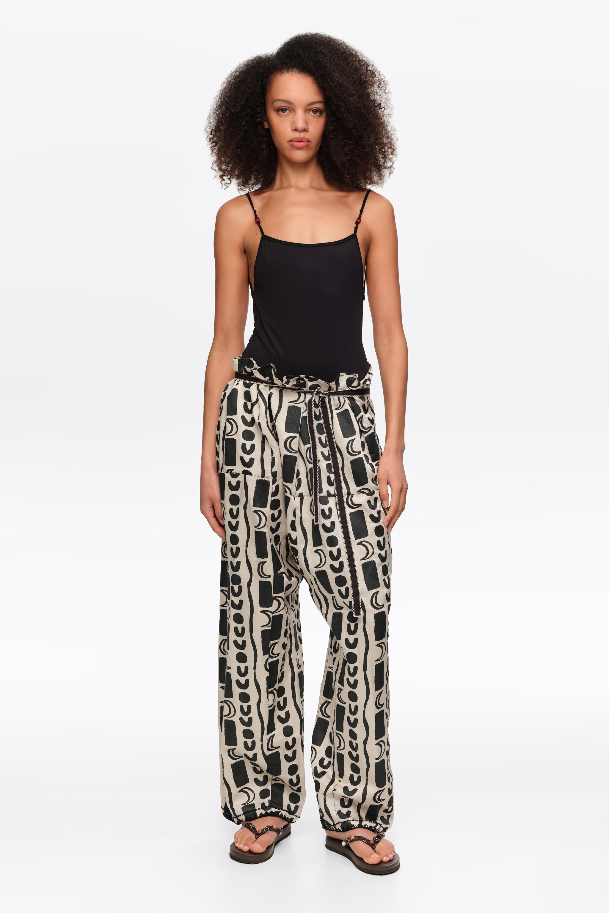 White fluid square-fit trousers with Moon stripes