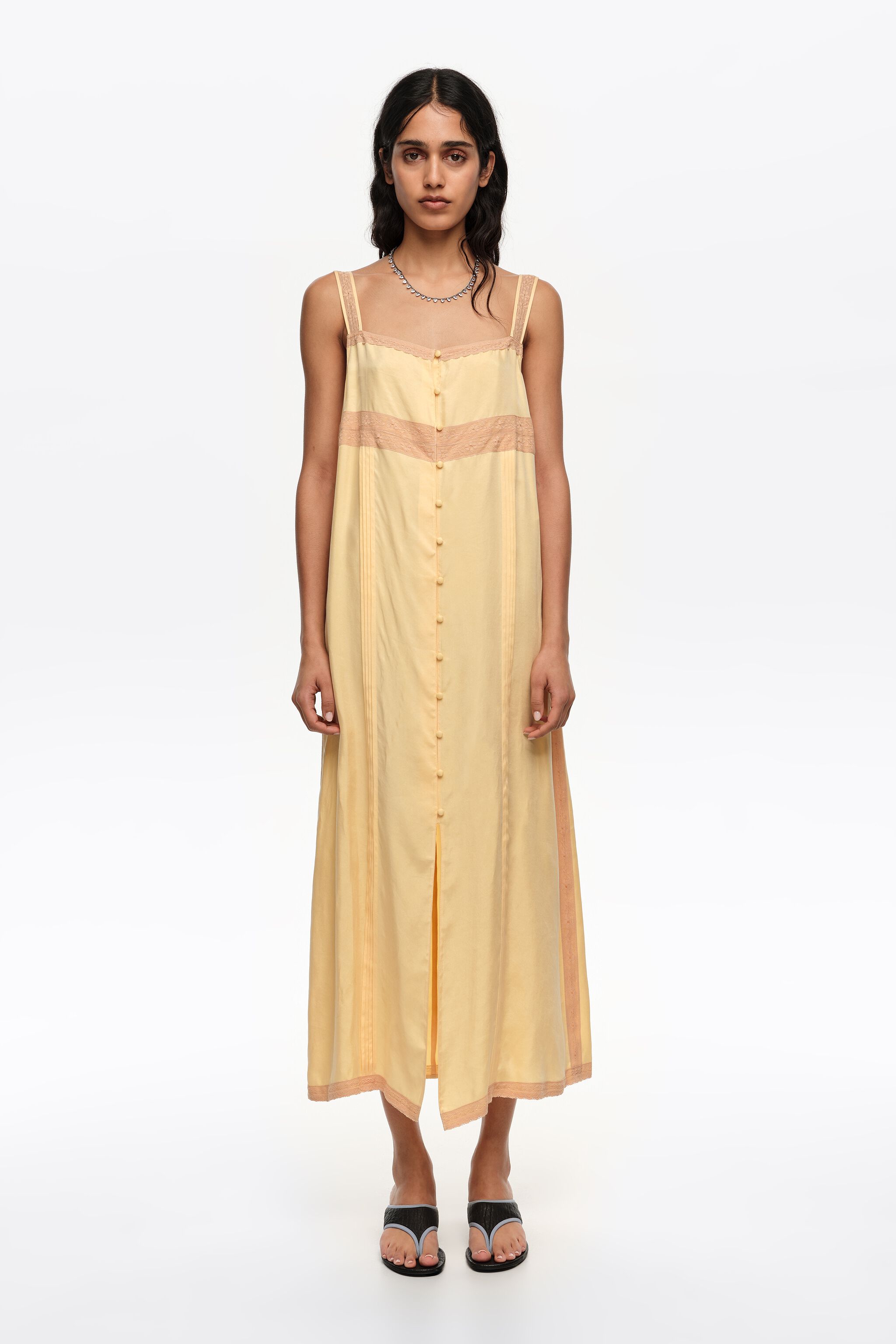 Yellow A-line dress with buttons and lace