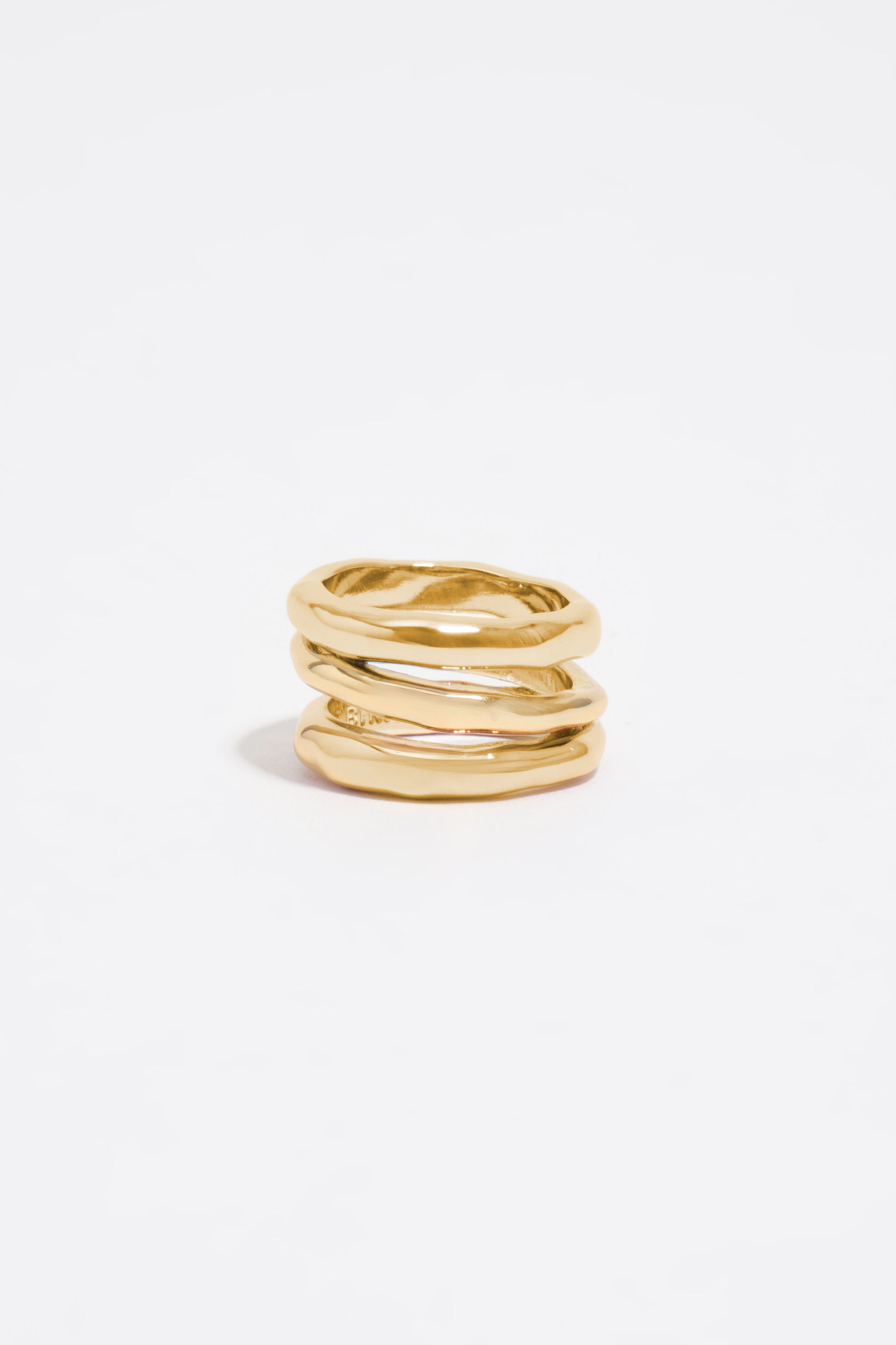 Textured matte gold three-band ring