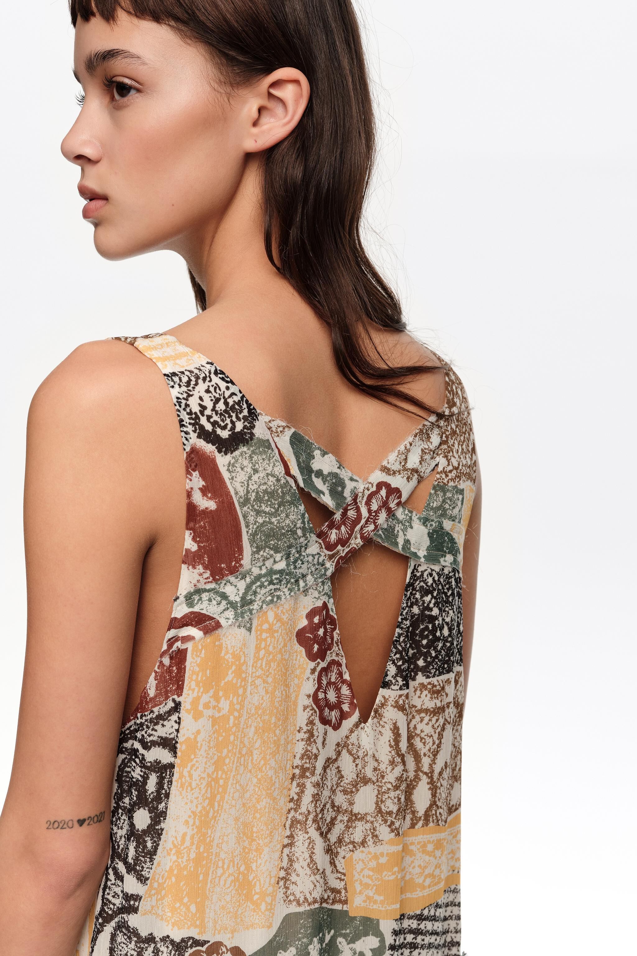 Ivory Lace irregular fluid dress with frayed details