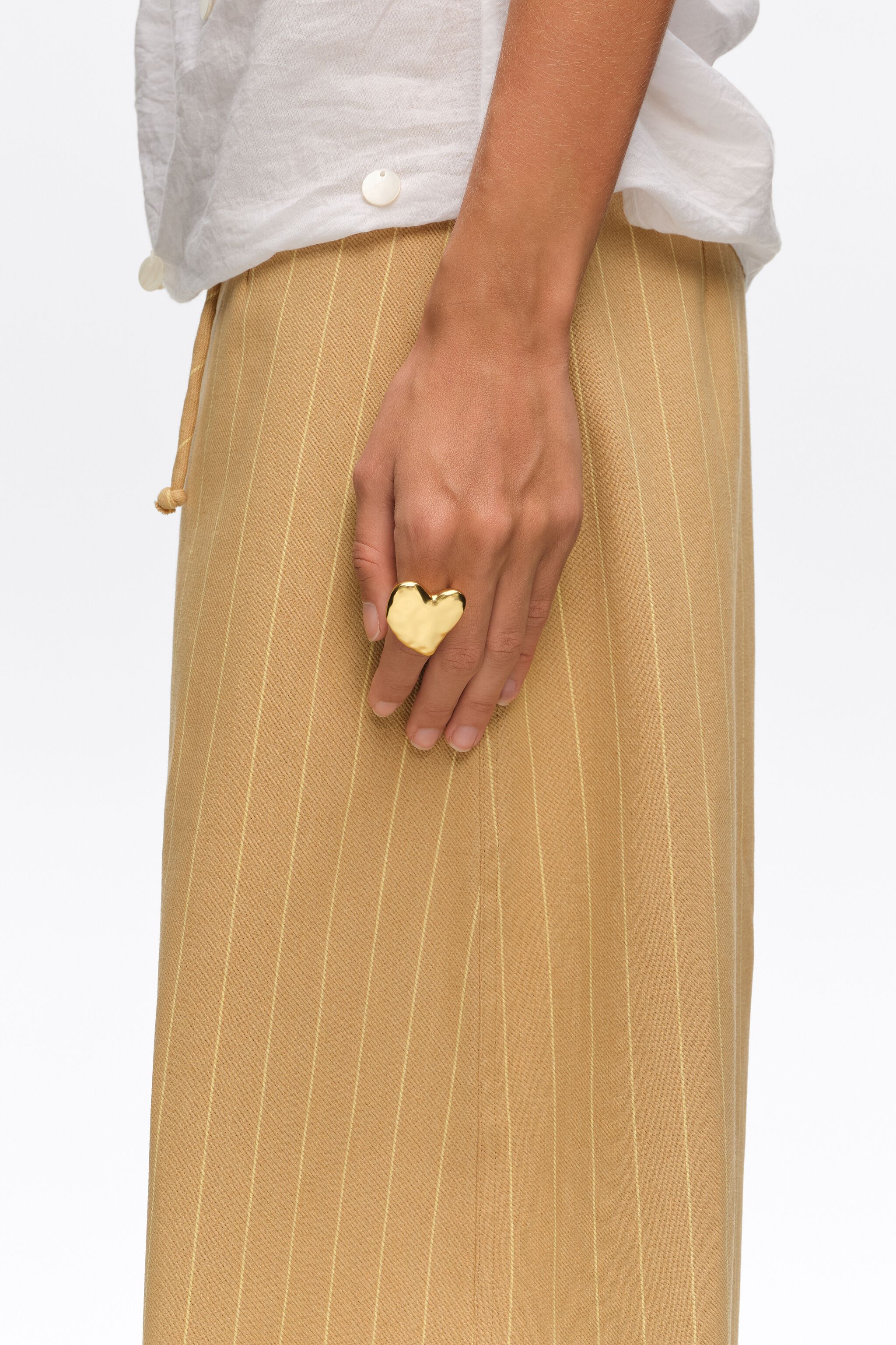 Matte gold textured heart ring