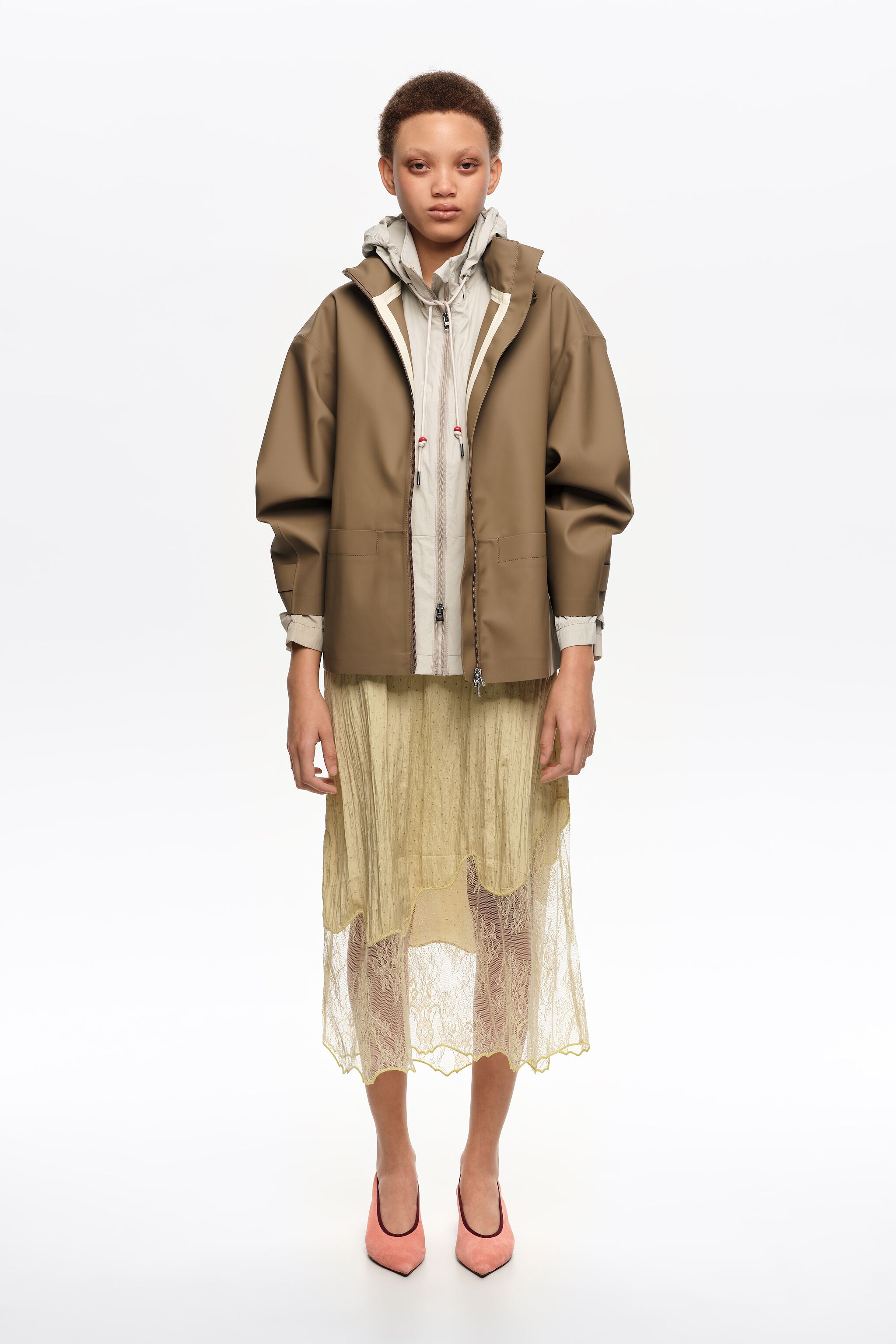 Dark camel rubberized A-line trench