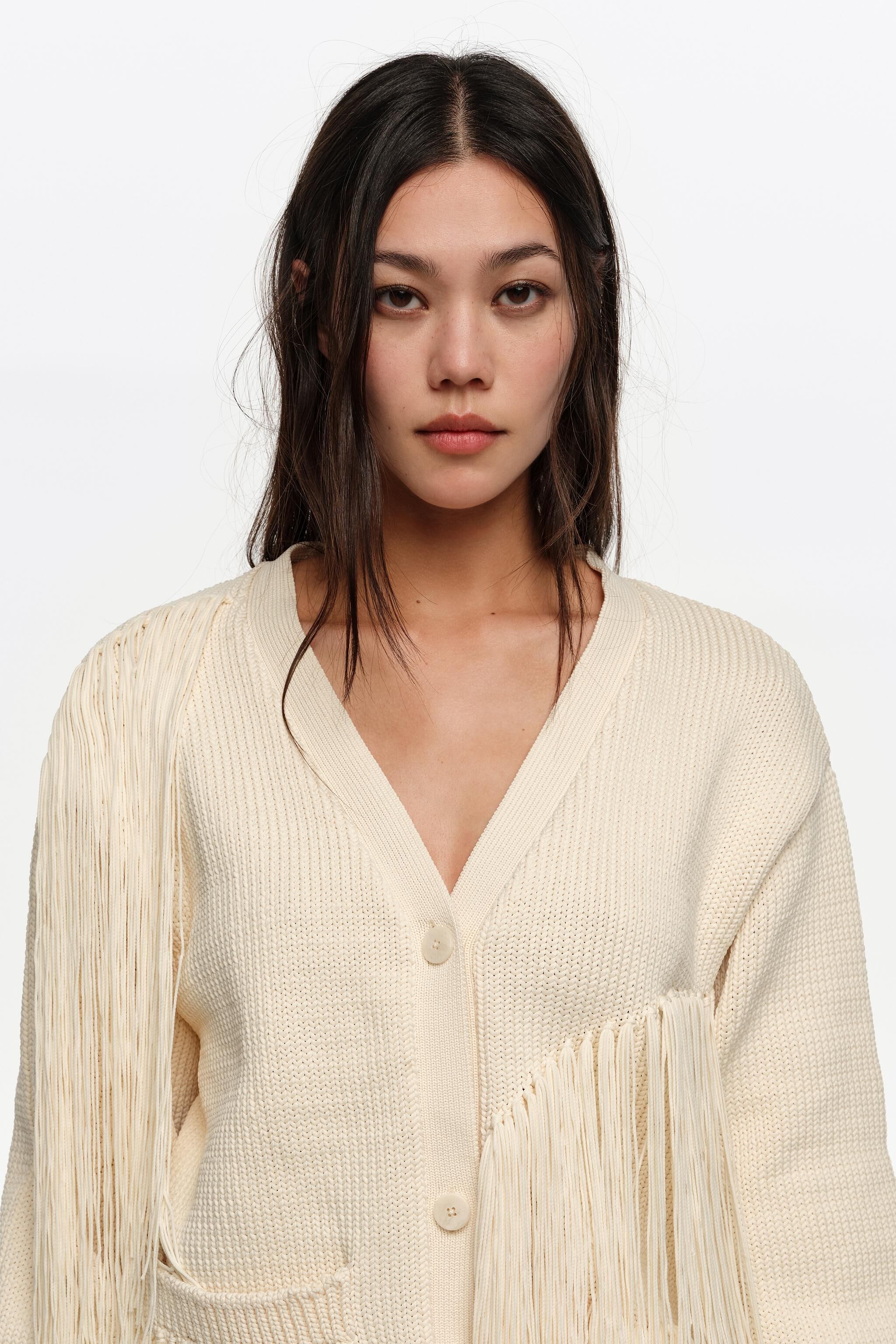 Ivory fringed knit cardigan