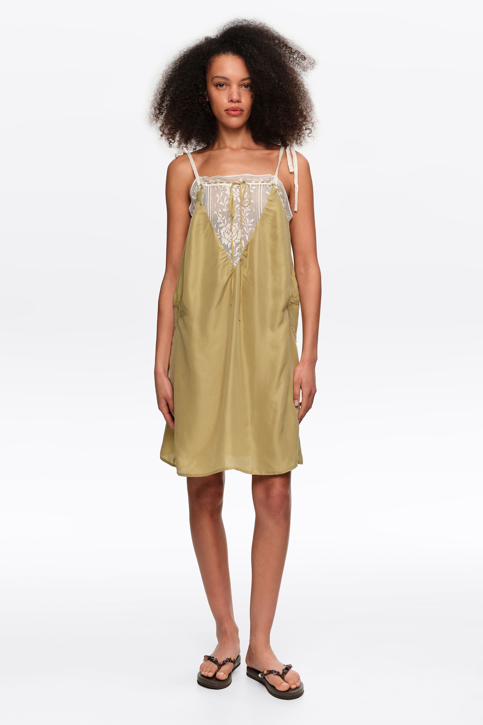 Short green silk strappy dress