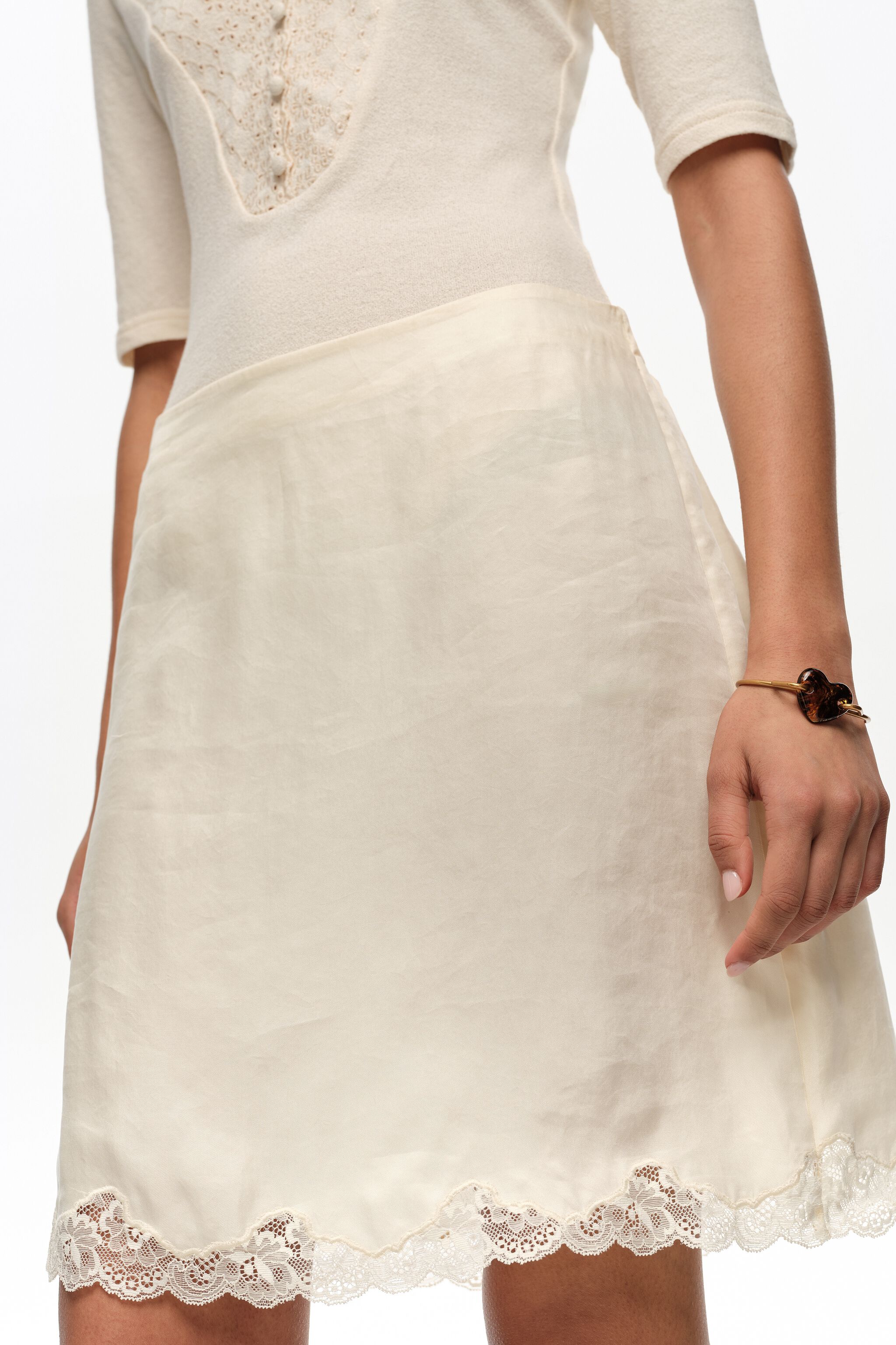 Ivory lace mini skirt