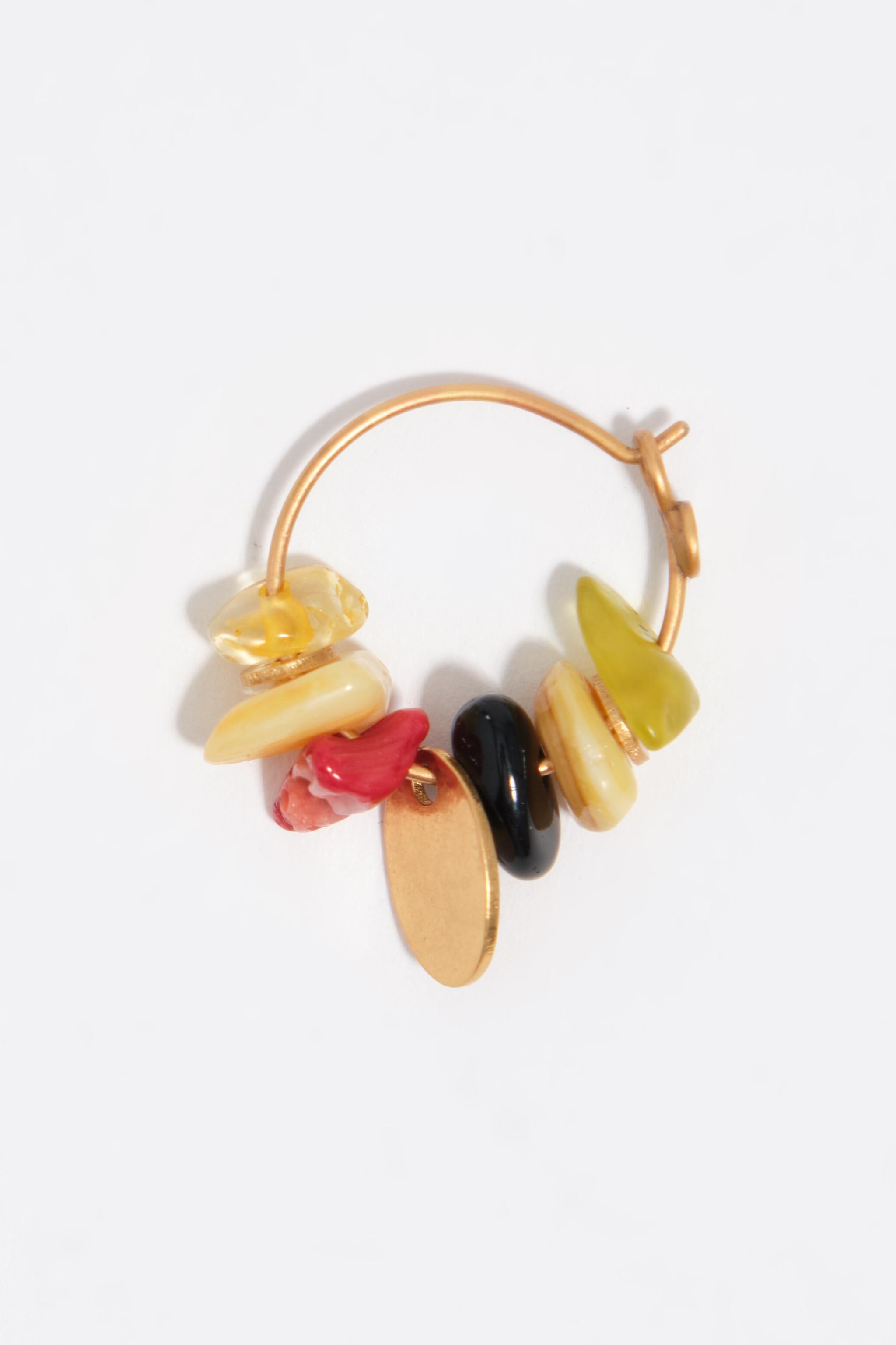 Hoop earrings with stones and aged gold metal texture