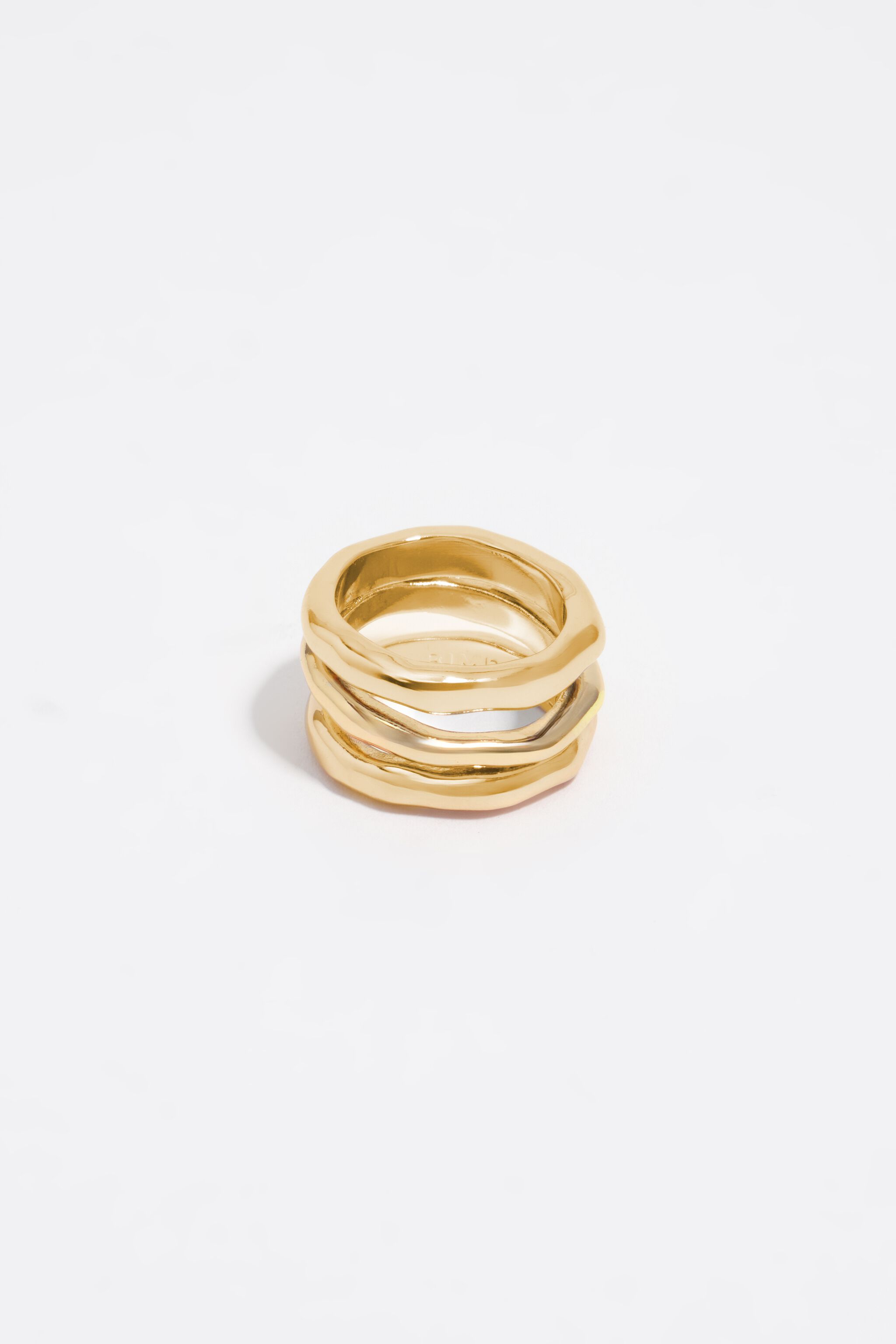 Textured matte gold three-band ring