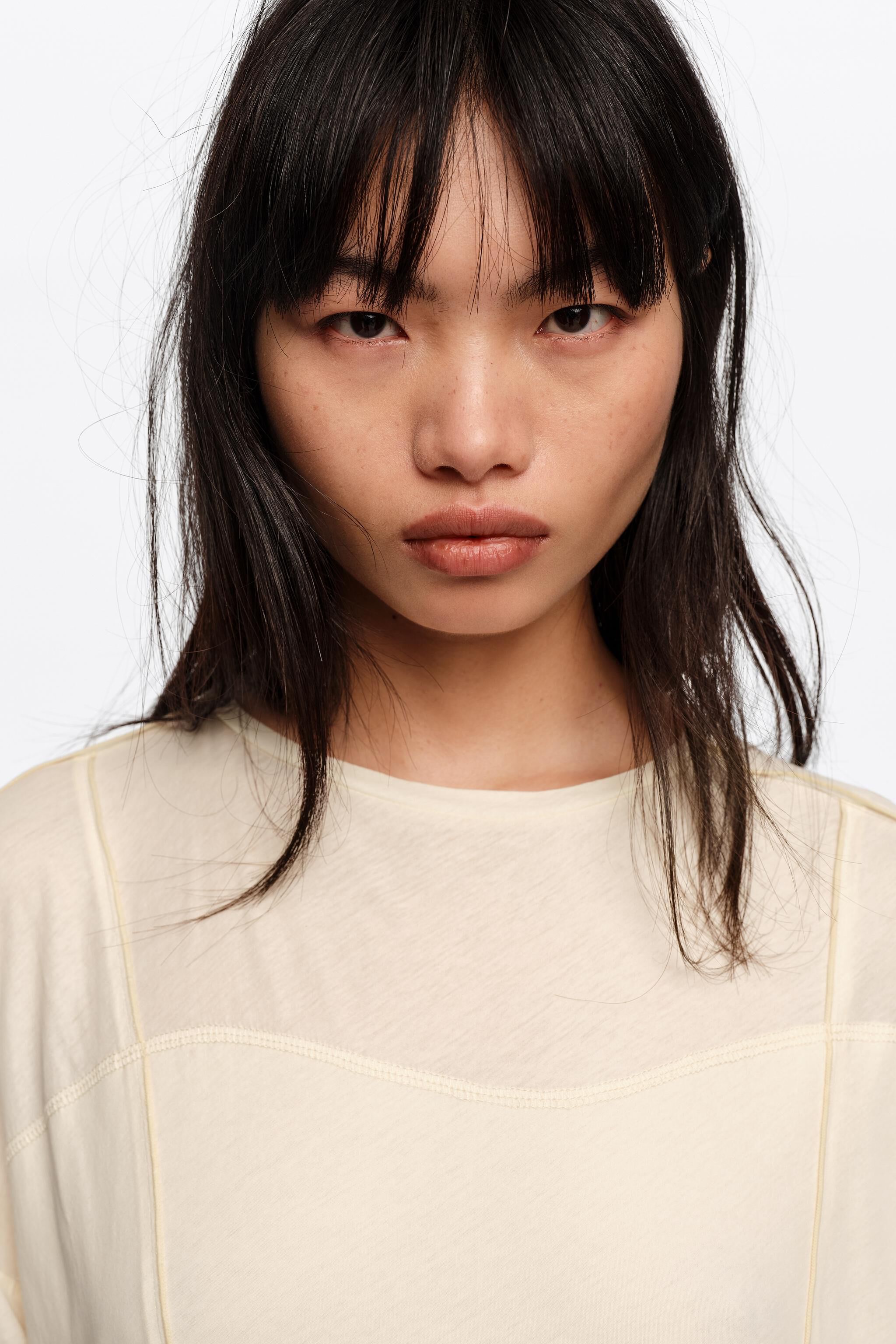 Underwater two-material dress with buttoned hem